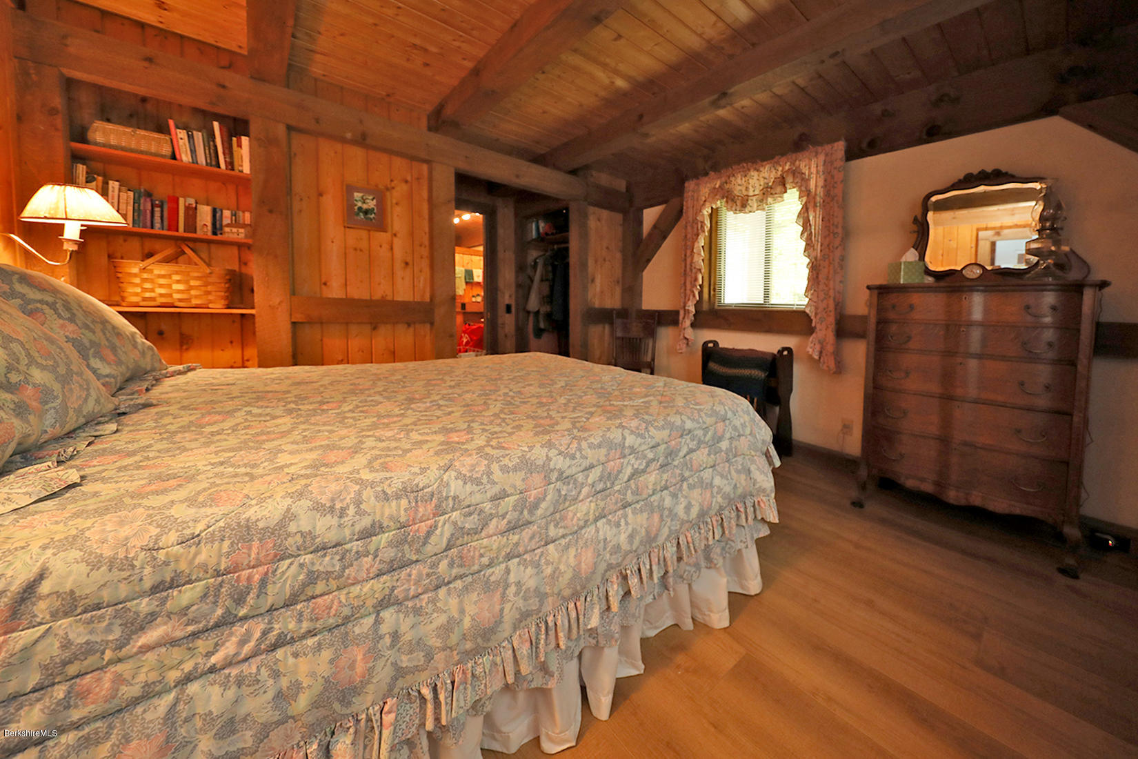 66 Ray Hubbard Road Otis, MA 01029 - Photo 12 of 21 a bed sitting in a spacious bedroom next to a window