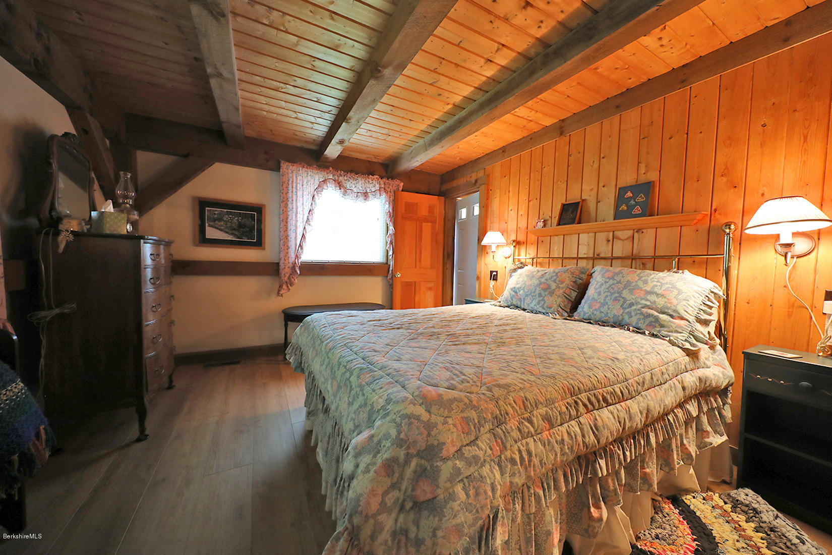 66 Ray Hubbard Road Otis, MA 01029 - Photo 13 of 21 a bed sitting in a bedroom next to a window
