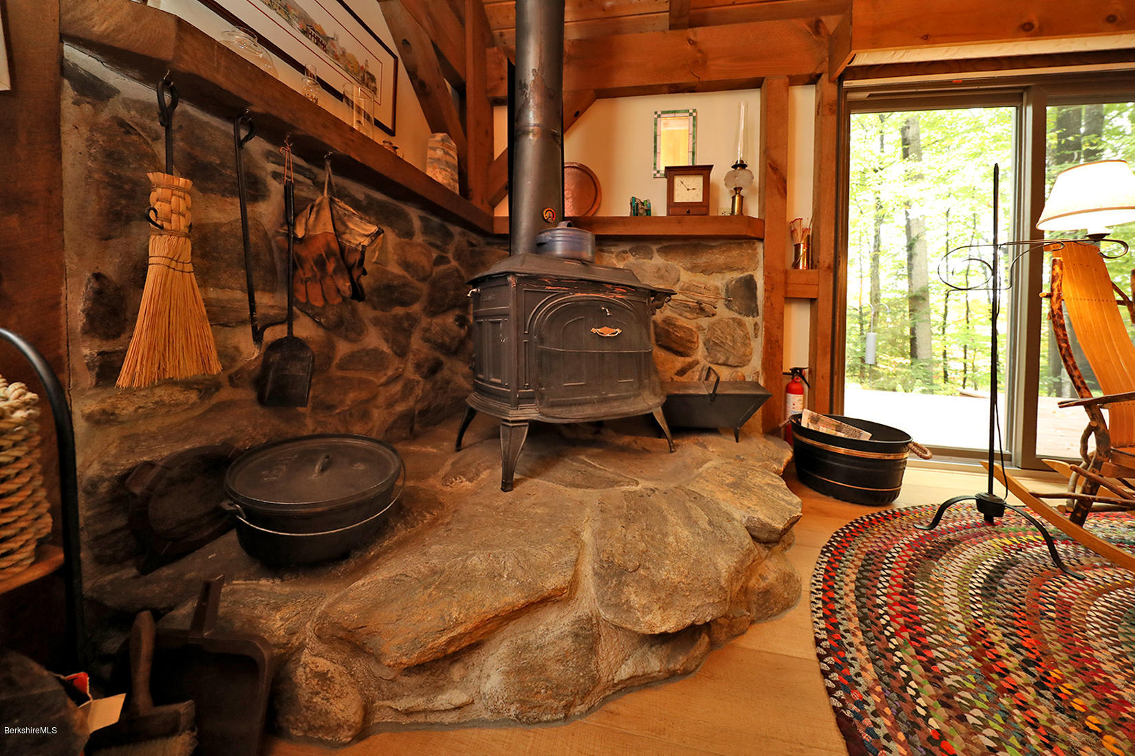 66 Ray Hubbard Road Otis, MA 01029 - Photo 8 of 21 a room with gym equipment and a large window
