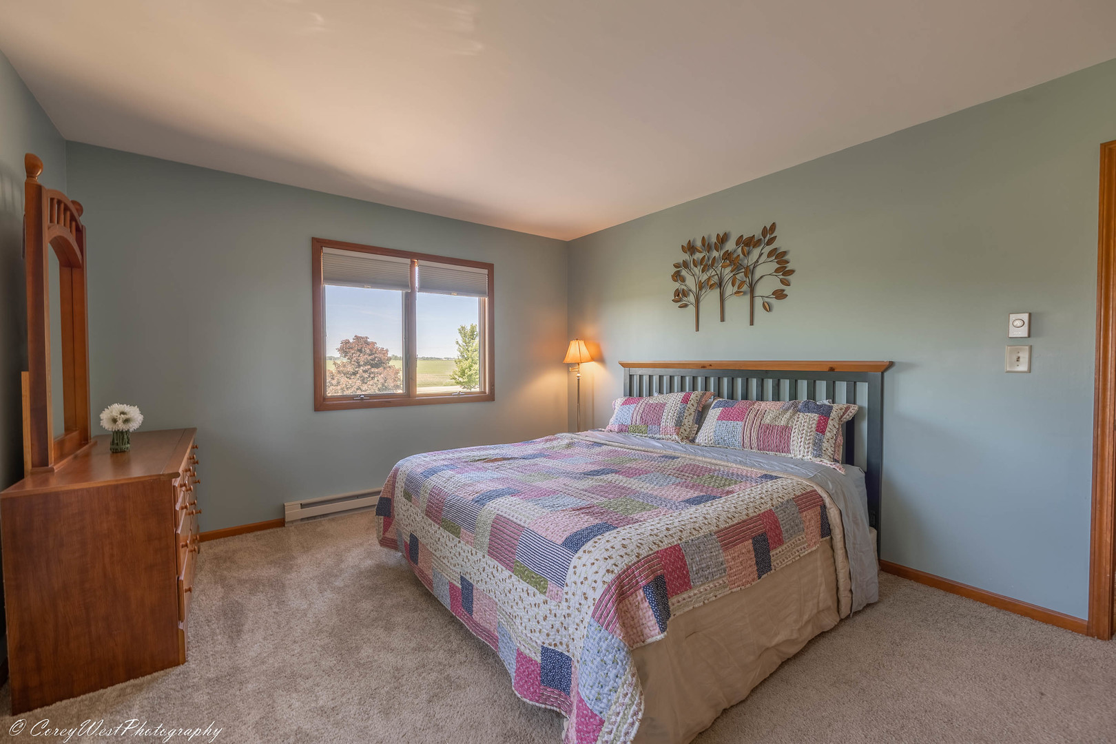35450 Genoa Road Genoa, IL 60135 - Photo 29 of 41 a bedroom with a bed and a window