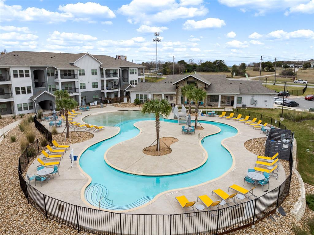 13301 Dessau Road, Unit 7203 Austin, TX 78754 - Photo 17 of 17 a view of a swimming pool with couches chairs