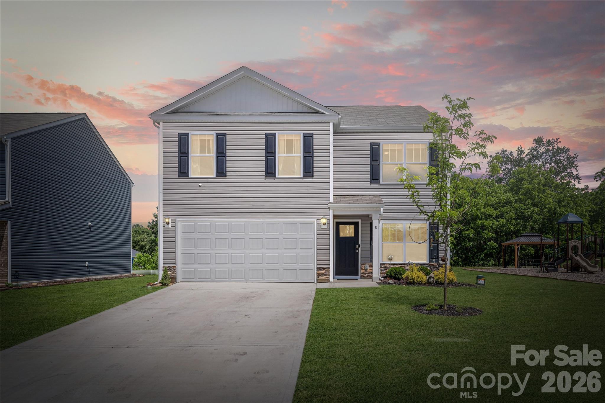 8 Madelyn Drive Clyde, NC 28721 - Photo 43 of 43 a front view of a house with a garden