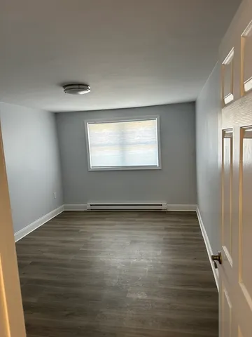 an empty room with window