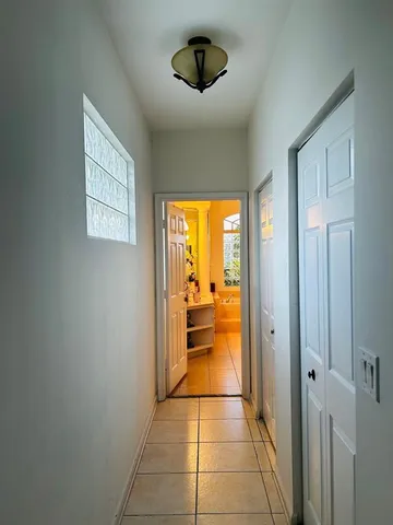 a bathroom with a tub and shower