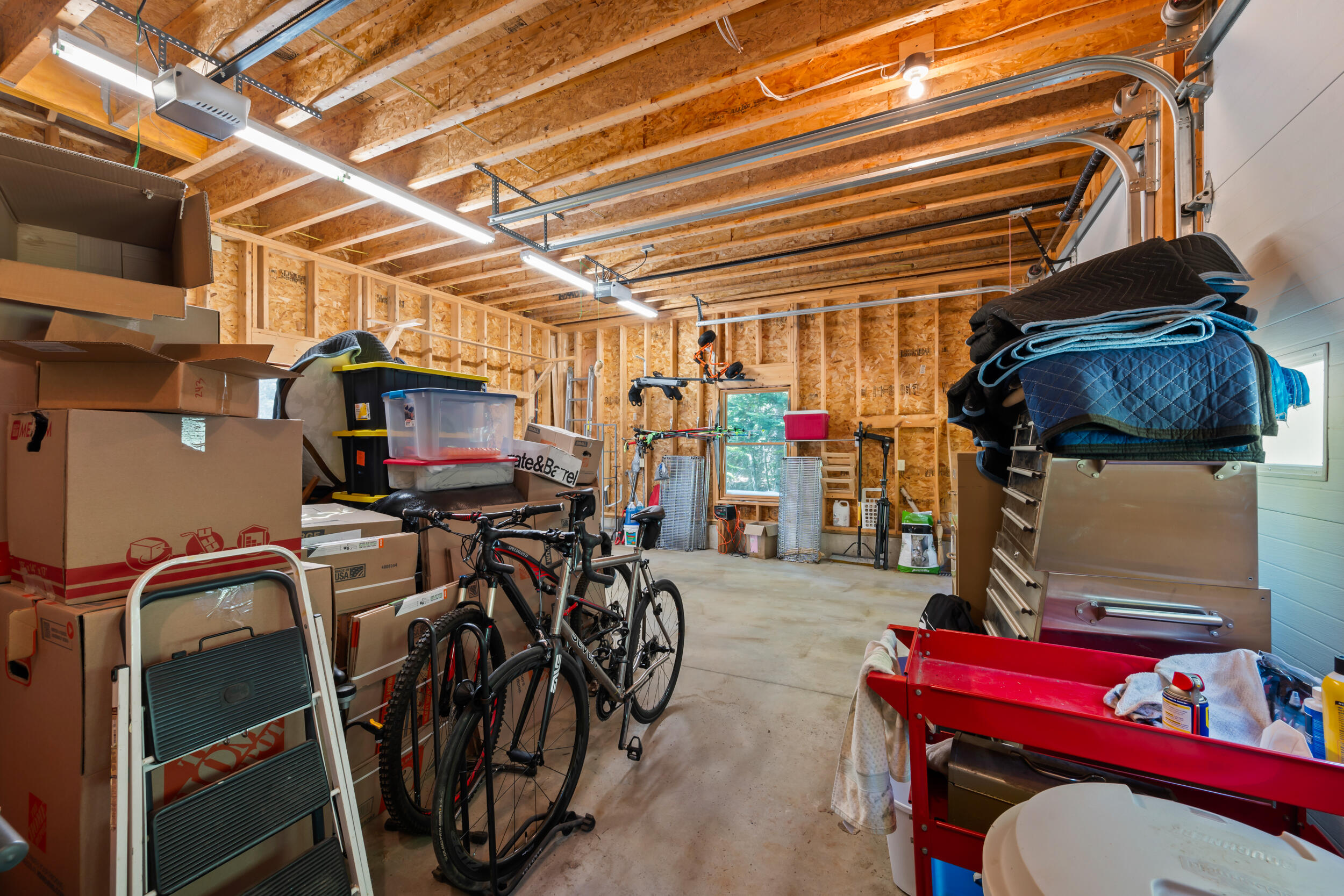 378 Mingo Loop Road Rangeley, ME 04970 - Photo 52 of 64 Garage With 12' Ceilings