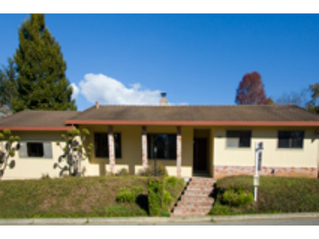 191 Greenbrier Drive Aptos, CA 95003 - Photo 1 of 19 a front view of a house with garden