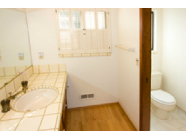 191 Greenbrier Drive Aptos, CA 95003 - Photo 14 of 19 a bathroom with a sink and a mirror