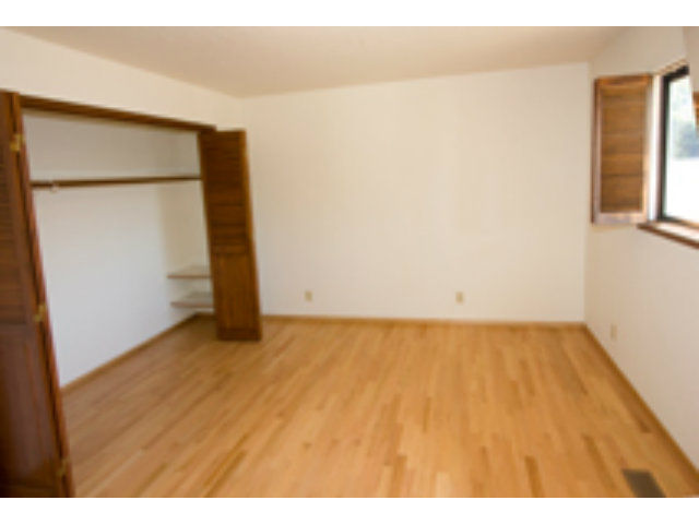 191 Greenbrier Drive Aptos, CA 95003 - Photo 19 of 19 a view of an empty room with wooden floor and a window