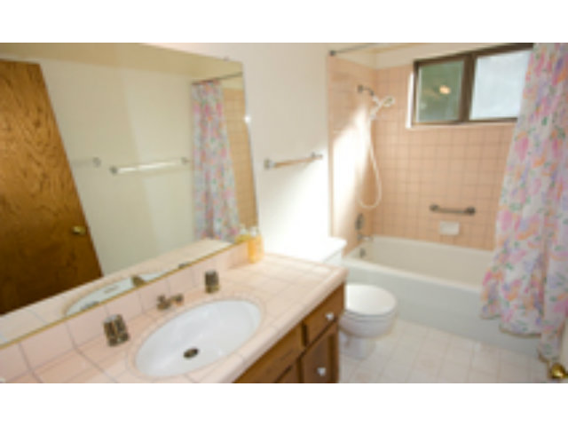 191 Greenbrier Drive Aptos, CA 95003 - Photo 8 of 19 a bathroom with a sink a toilet and shower