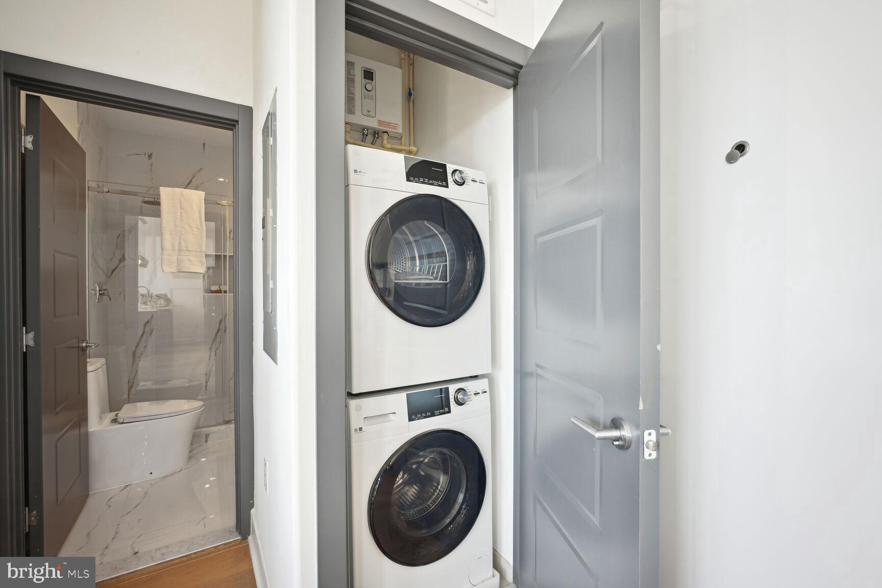3619 Georgia Avenue Northwest, Unit 405 Washington, DC 20010 - Photo 11 of 16 a utility room with dryer and washer