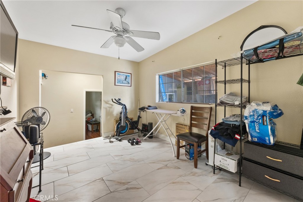 276 East Merrill Avenue Rialto, CA 92376 - Photo 24 of 35 a view of a room with gym equipment