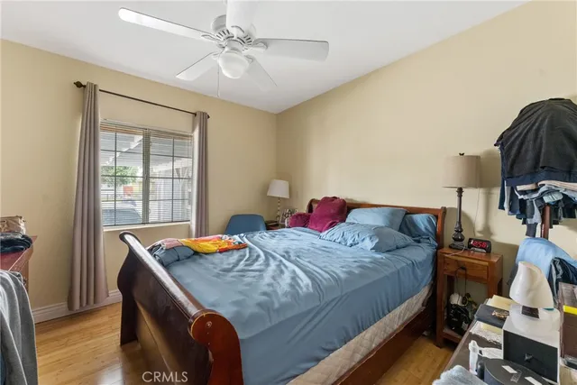 a bedroom with a bed and a table