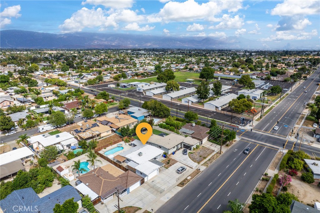 276 East Merrill Avenue Rialto, CA 92376 - Photo 32 of 35 an aerial view of residential houses with outdoor space