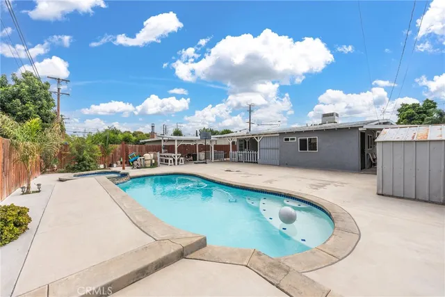 a view of a house with swimming pool