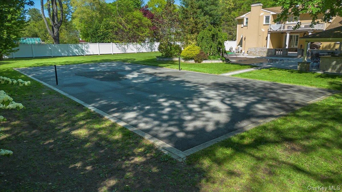 626 Caledonia Road Dix Hills, NY 11746 - Photo 35 of 49 a view of a back yard of the house