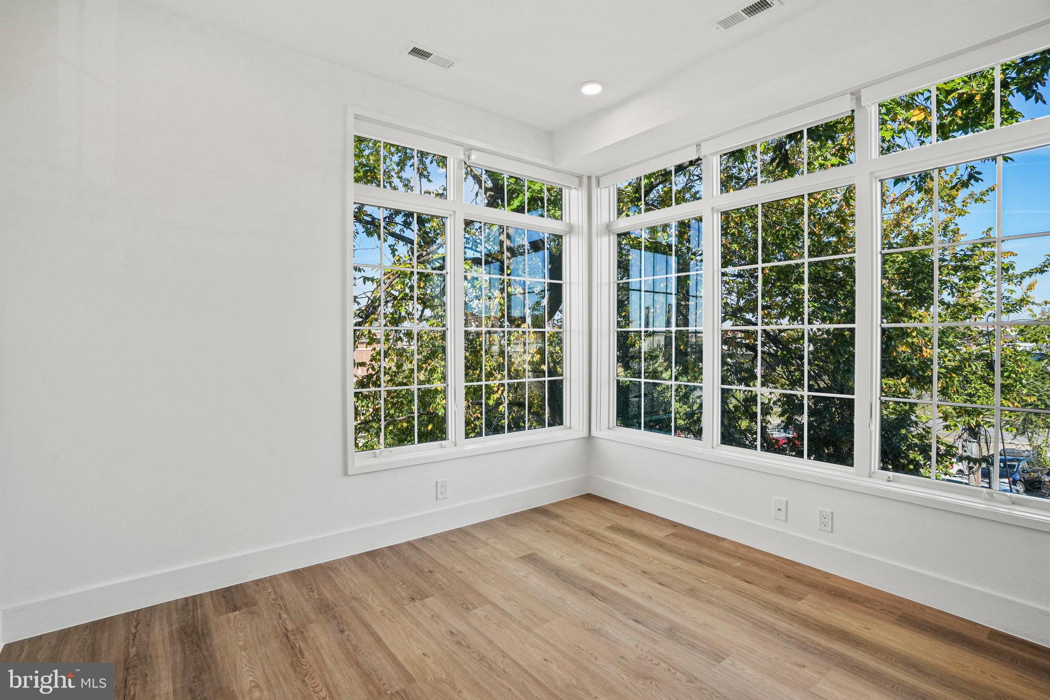 716 L Street Southeast, Unit 403 Washington, DC 20003 - Photo 11 of 17 a view of an empty room with a window