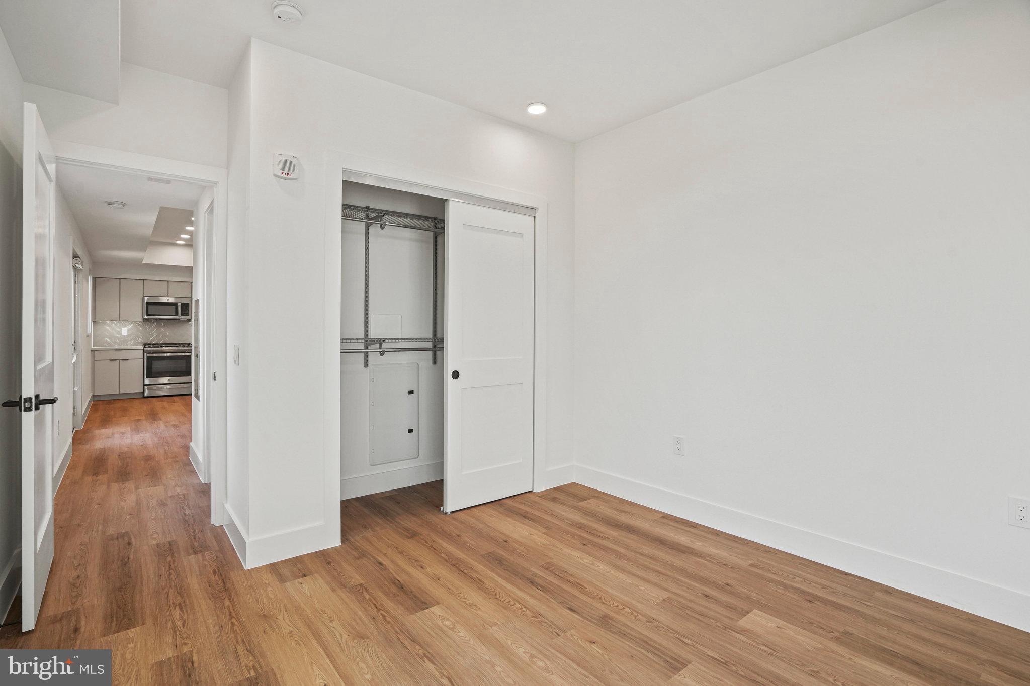 716 L Street Southeast, Unit 403 Washington, DC 20003 - Photo 13 of 17 wooden floor in an empty room