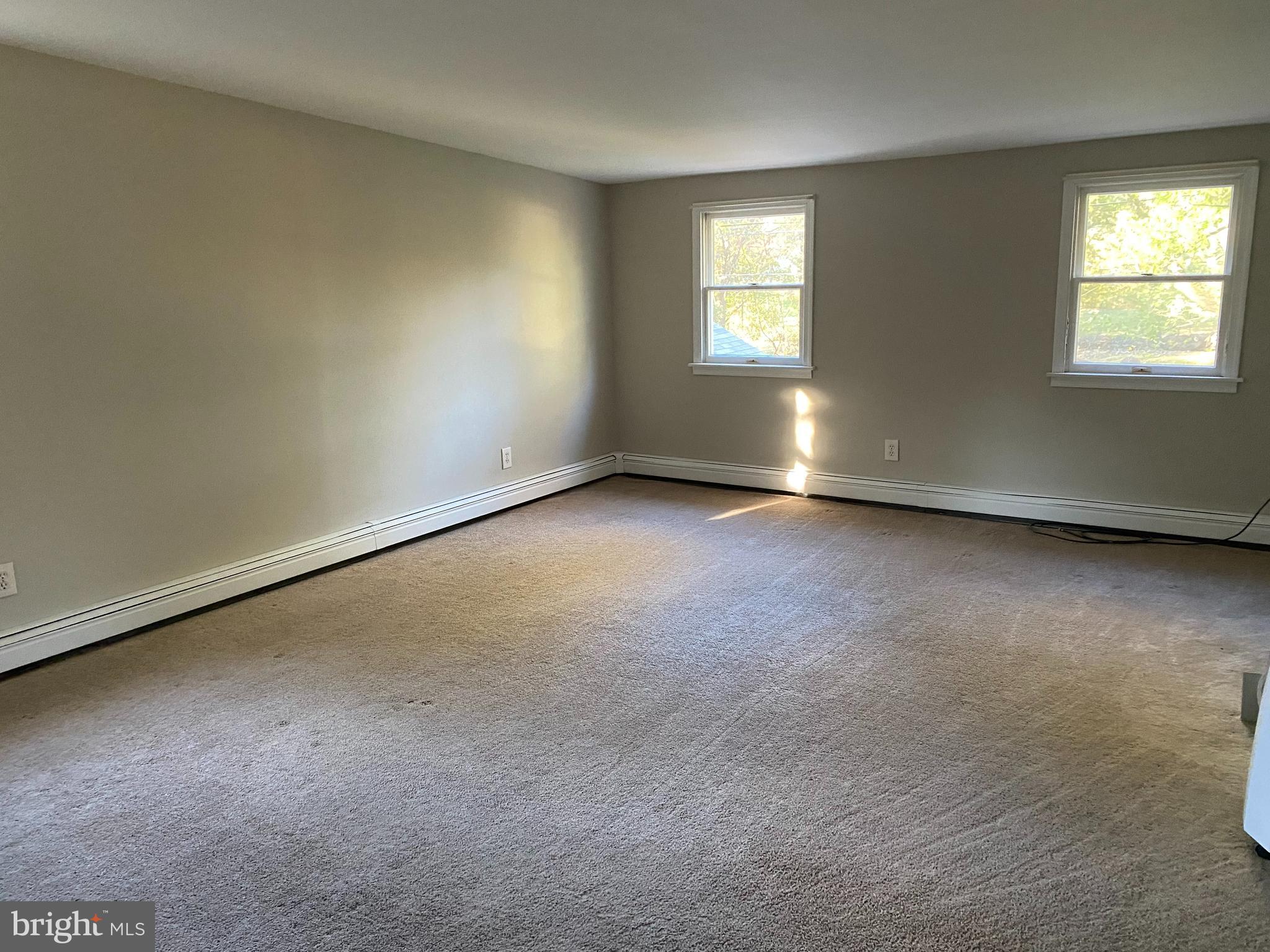 1171 West County Line Road Hatboro, PA 19040 - Photo 16 of 22 an empty room with windows
