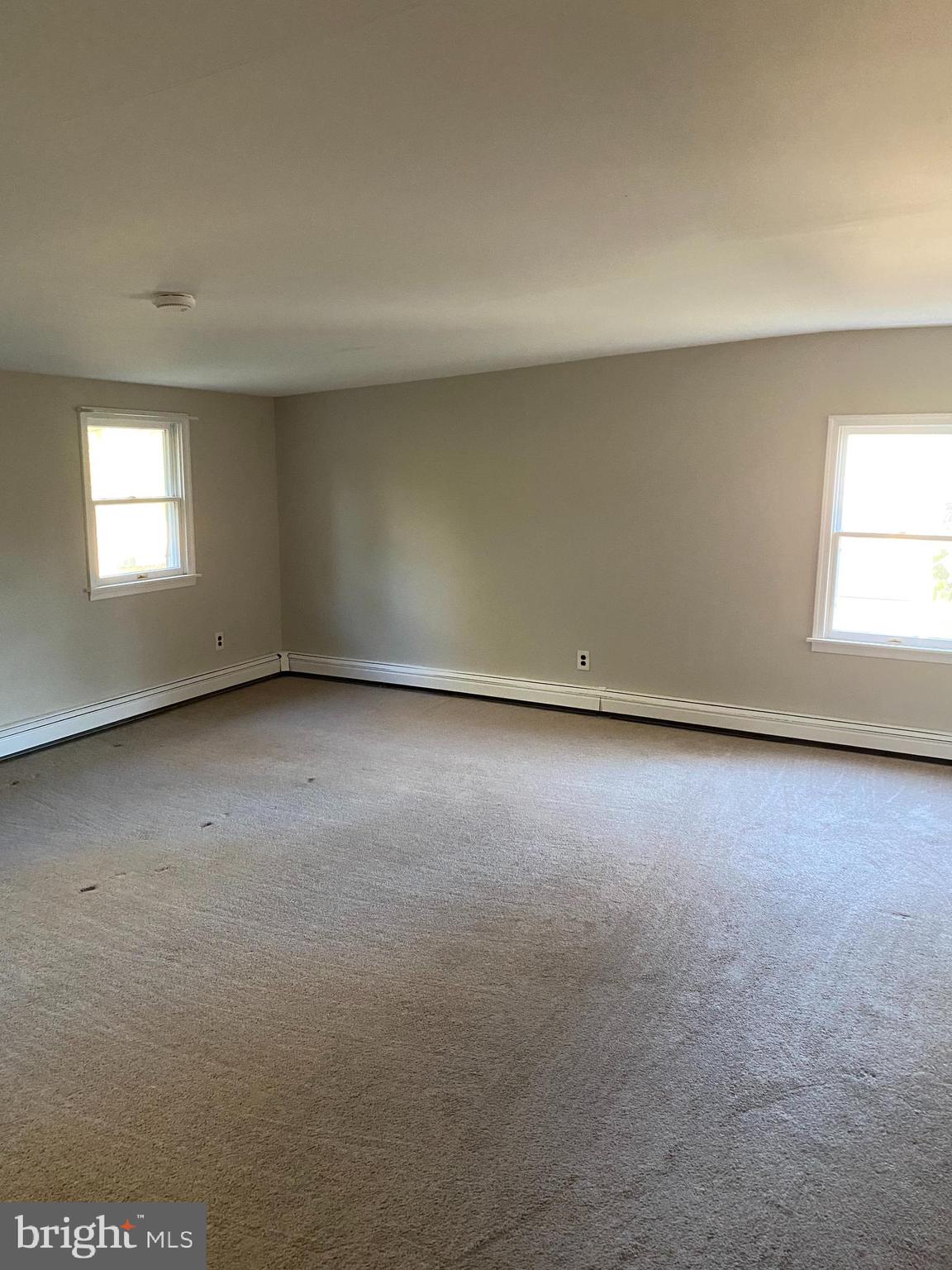 1171 West County Line Road Hatboro, PA 19040 - Photo 17 of 22 an empty room with a window