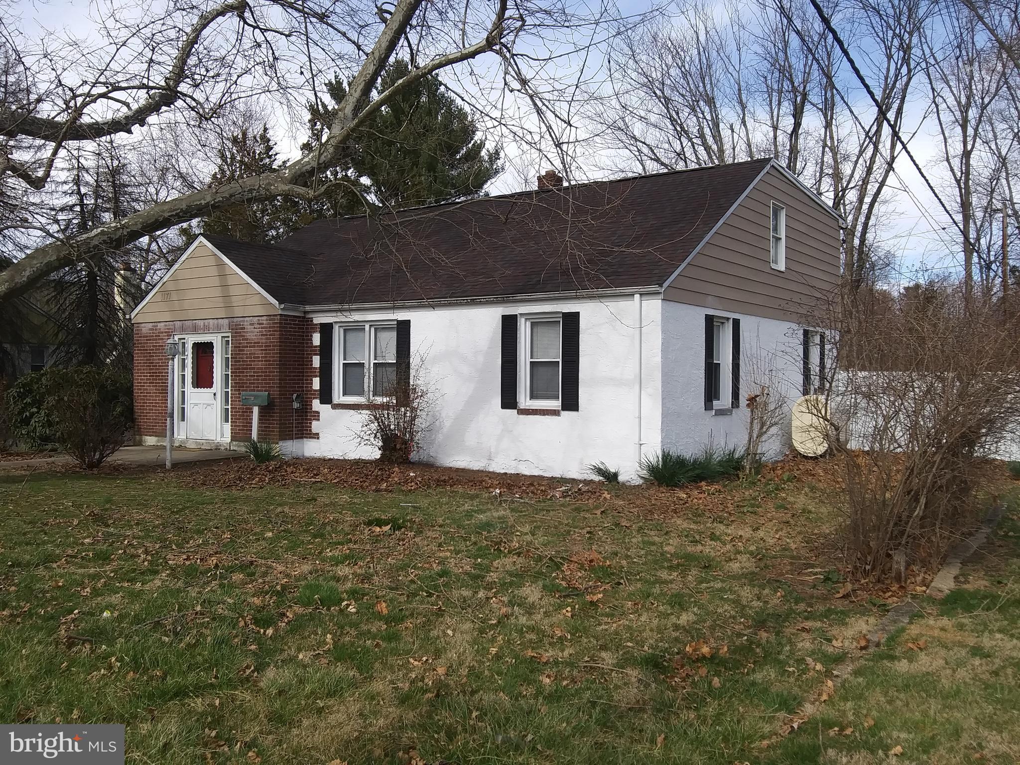 1171 West County Line Road Hatboro, PA 19040 - Photo 20 of 22 a view of a house with a yard