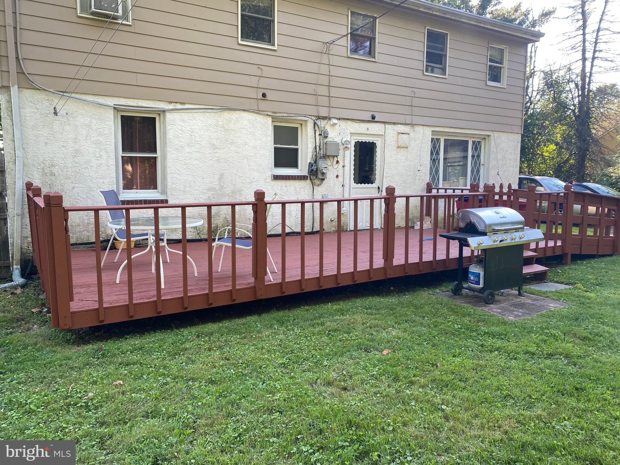 1171 West County Line Road Hatboro, PA 19040 - Photo 5 of 22 a view of a house with a backyard and porch