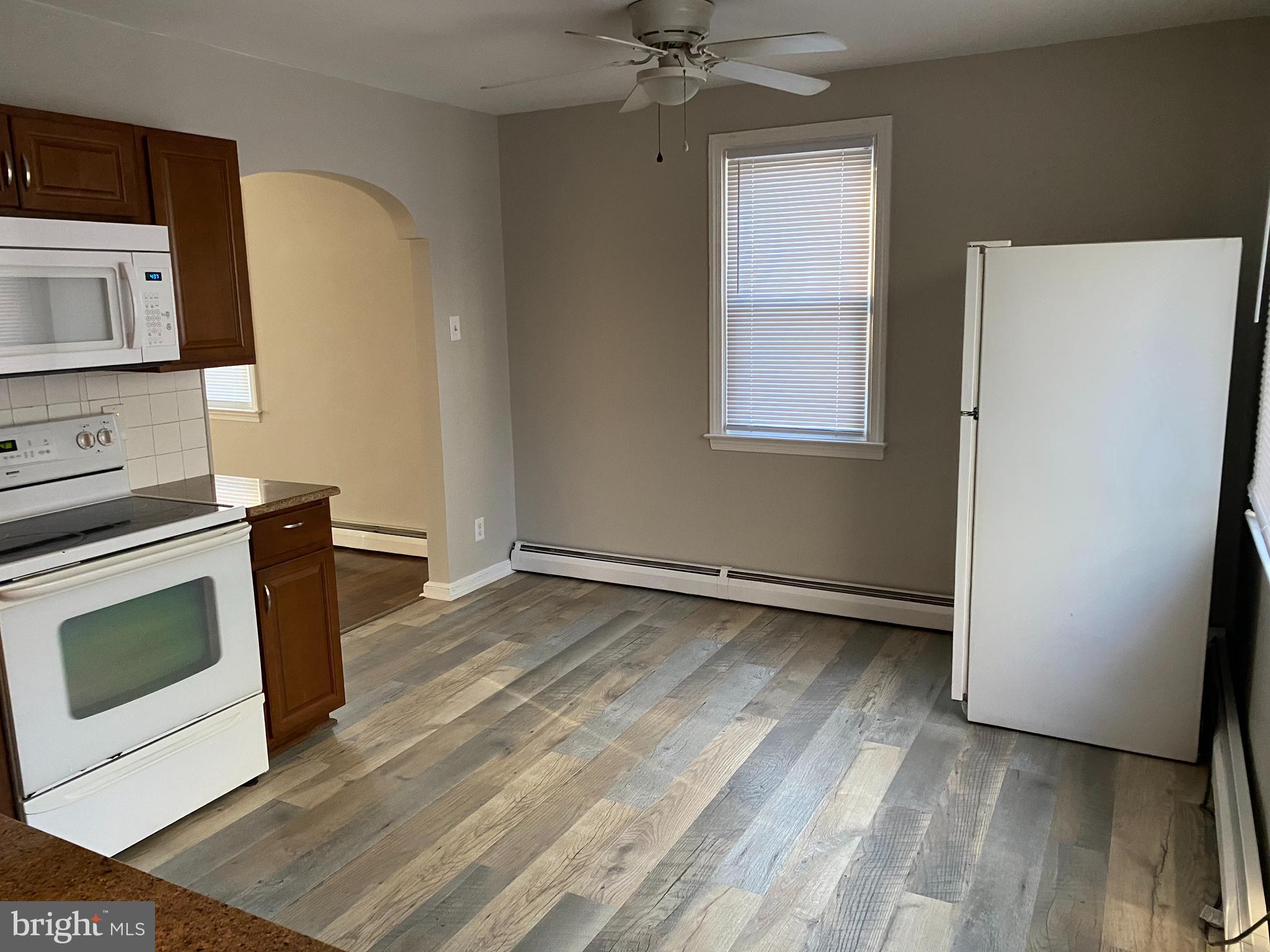 1171 West County Line Road Hatboro, PA 19040 - Photo 7 of 22 a view of a kitchen with a sink oven dryer and washer