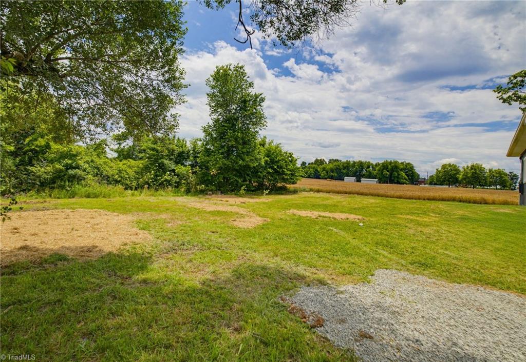 7922 Troxler Mill Road Gibsonville, NC 27249 - Photo 23 of 27