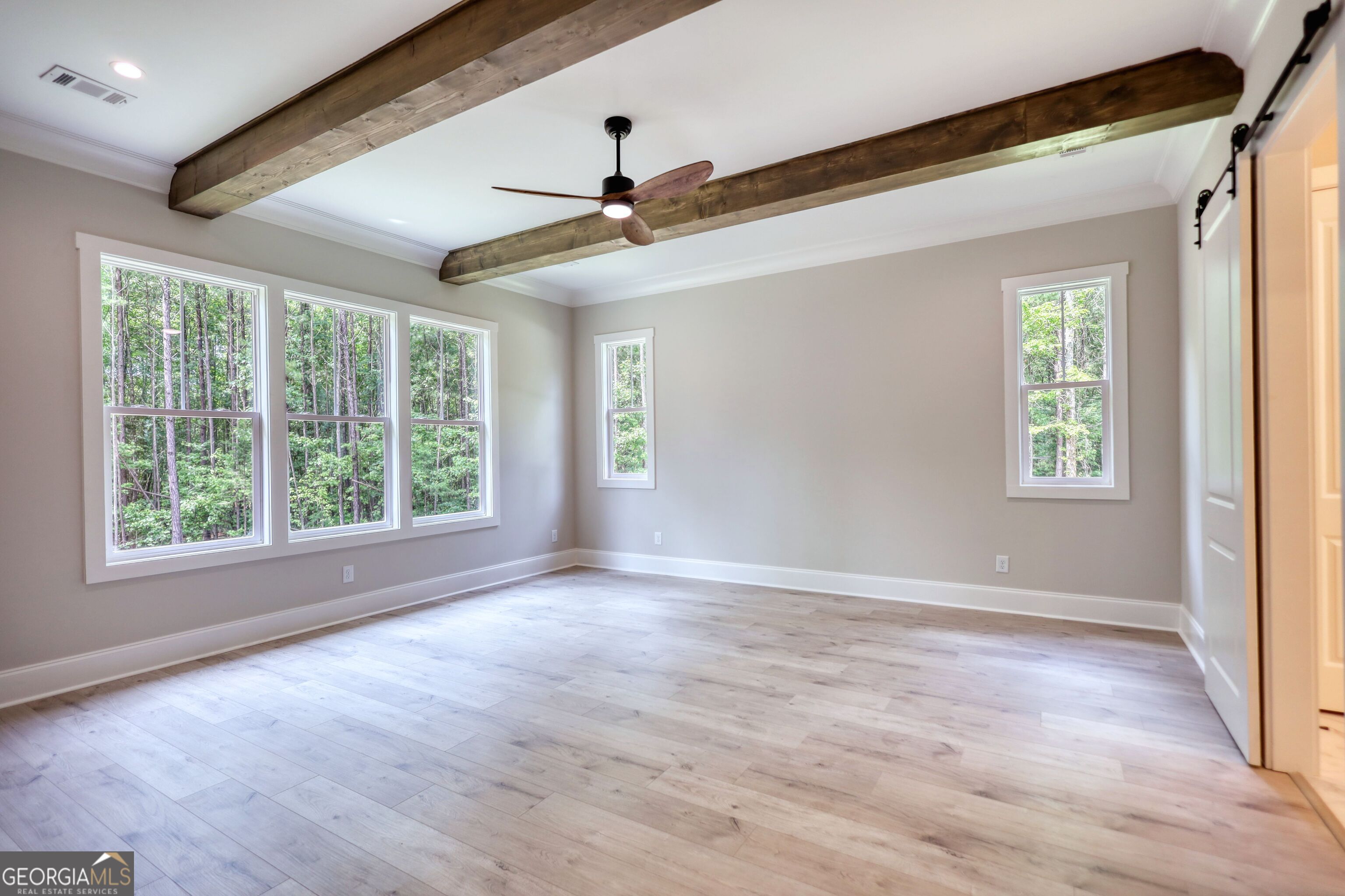 1031 Graham Drive Madison, GA 30650 - Photo 50 of 78 a view of an empty room with a window