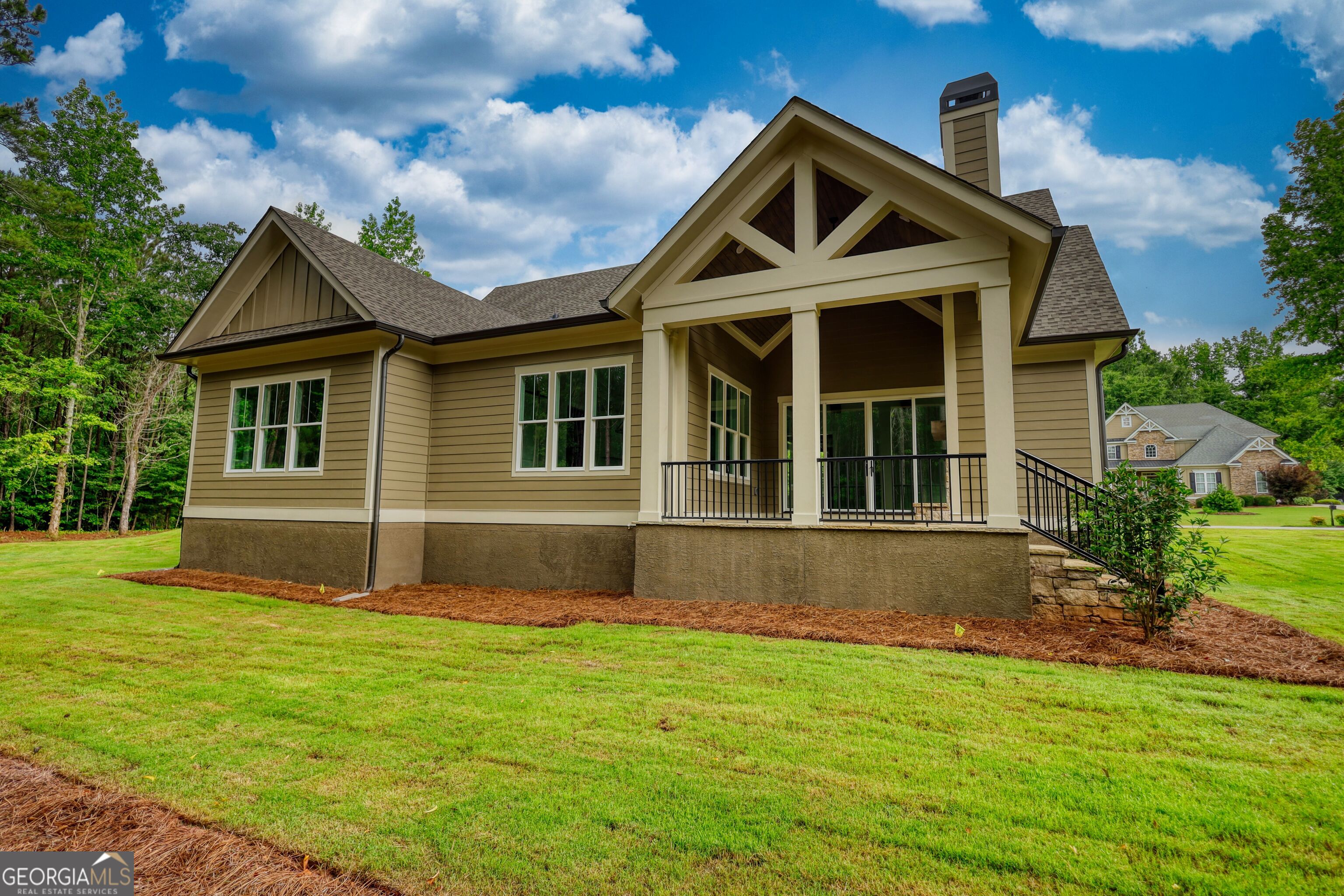 1031 Graham Drive Madison, GA 30650 - Photo 77 of 78 a front view of a house with garden