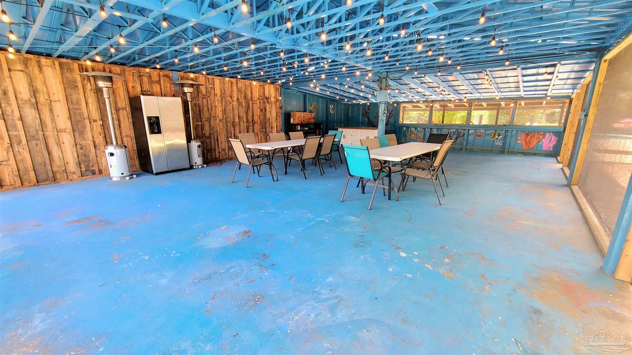 3375 Robinson Point Road Milton, FL 32583 - Photo 39 of 50 a view of a chairs in an empty room