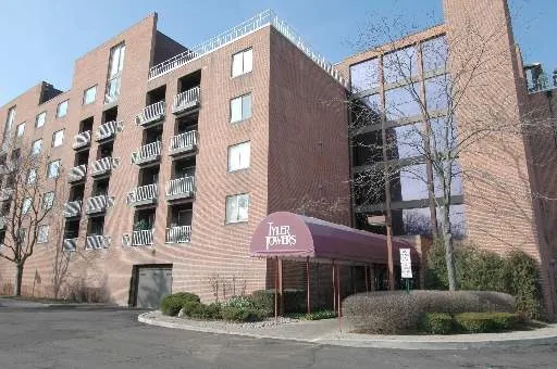 a front view of a building with a street