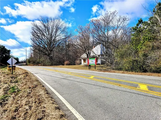 a view of swimming pool with trees