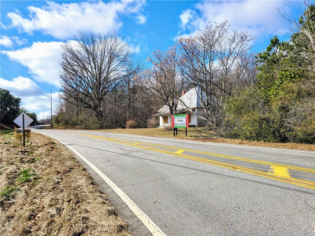 192 Old Peachtree Road Northeast Suwanee, GA 30024 - Photo 5 of 10 a view of swimming pool with trees