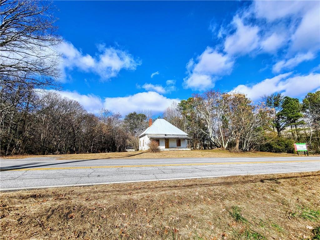 192 Old Peachtree Road Northeast Suwanee, GA 30024 - Photo 7 of 10 a front view of a house with a yard