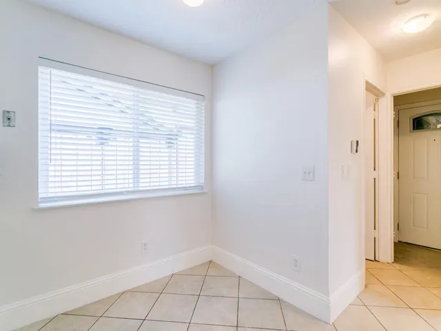 a view of an empty room with window