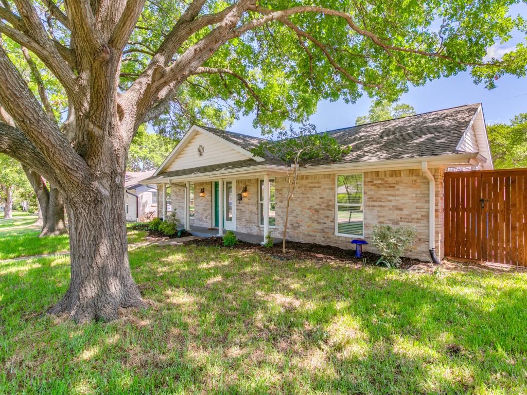 510 Copper Ridge Drive Richardson, TX 75080 - Photo 2 of 25 a view of a house with a yard