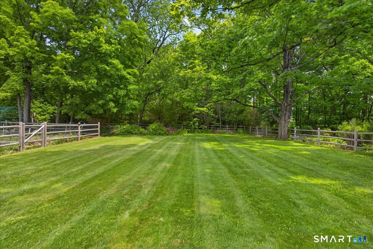 1006 King Road Cheshire, CT 06410 - Photo 30 of 40 The fully fenced and level back yard is a dream for playing, entertaining and gardening.