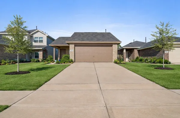 a front view of house with yard
