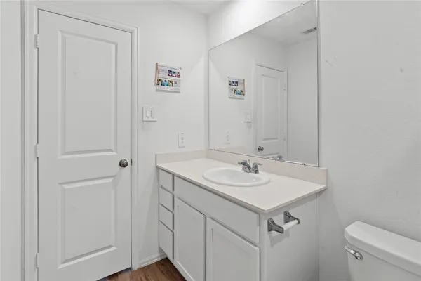 a bathroom with a sink and a toilet