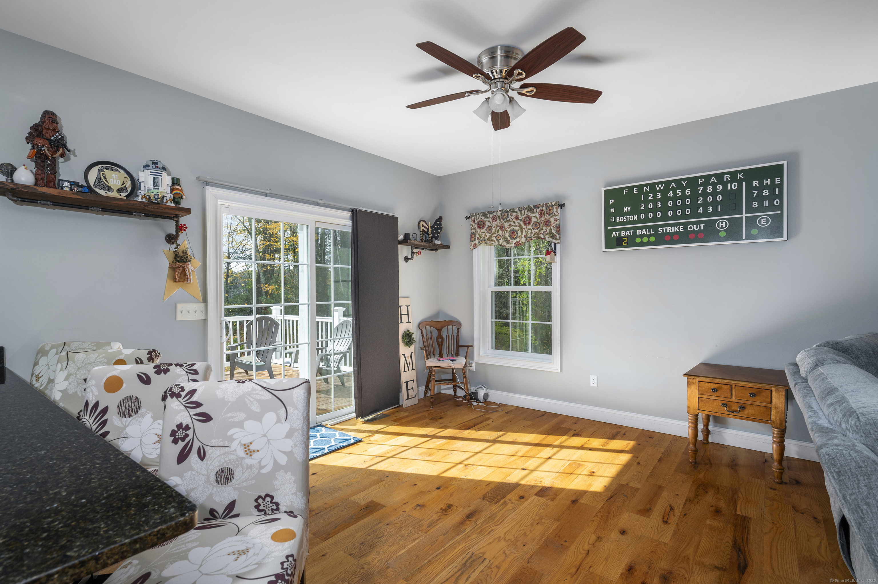153 Wauregan Road Canterbury, CT 06331 - Photo 20 of 40 a bed sitting in a bedroom next to a window