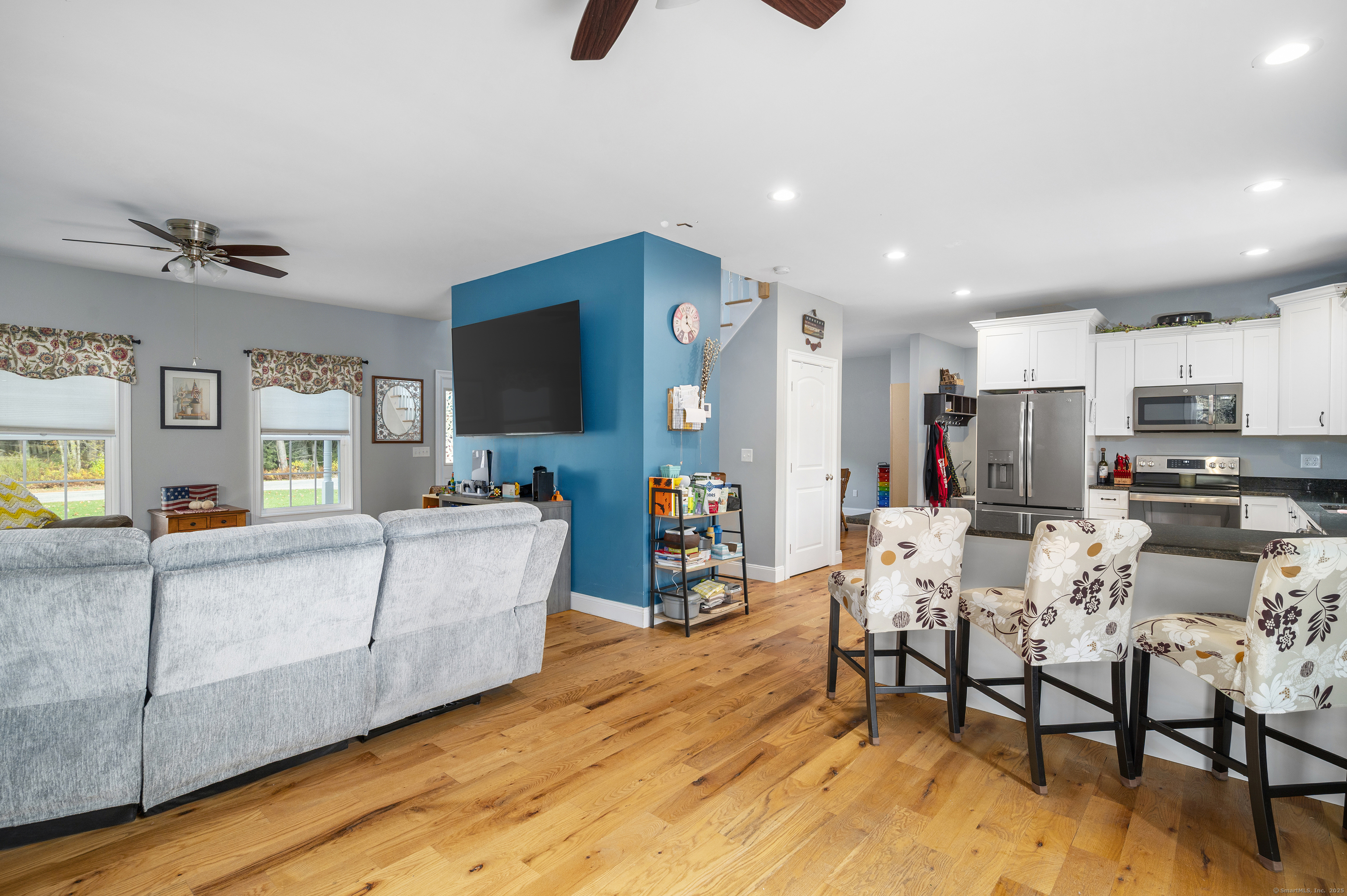 153 Wauregan Road Canterbury, CT 06331 - Photo 21 of 40 a living room with furniture and a flat screen tv