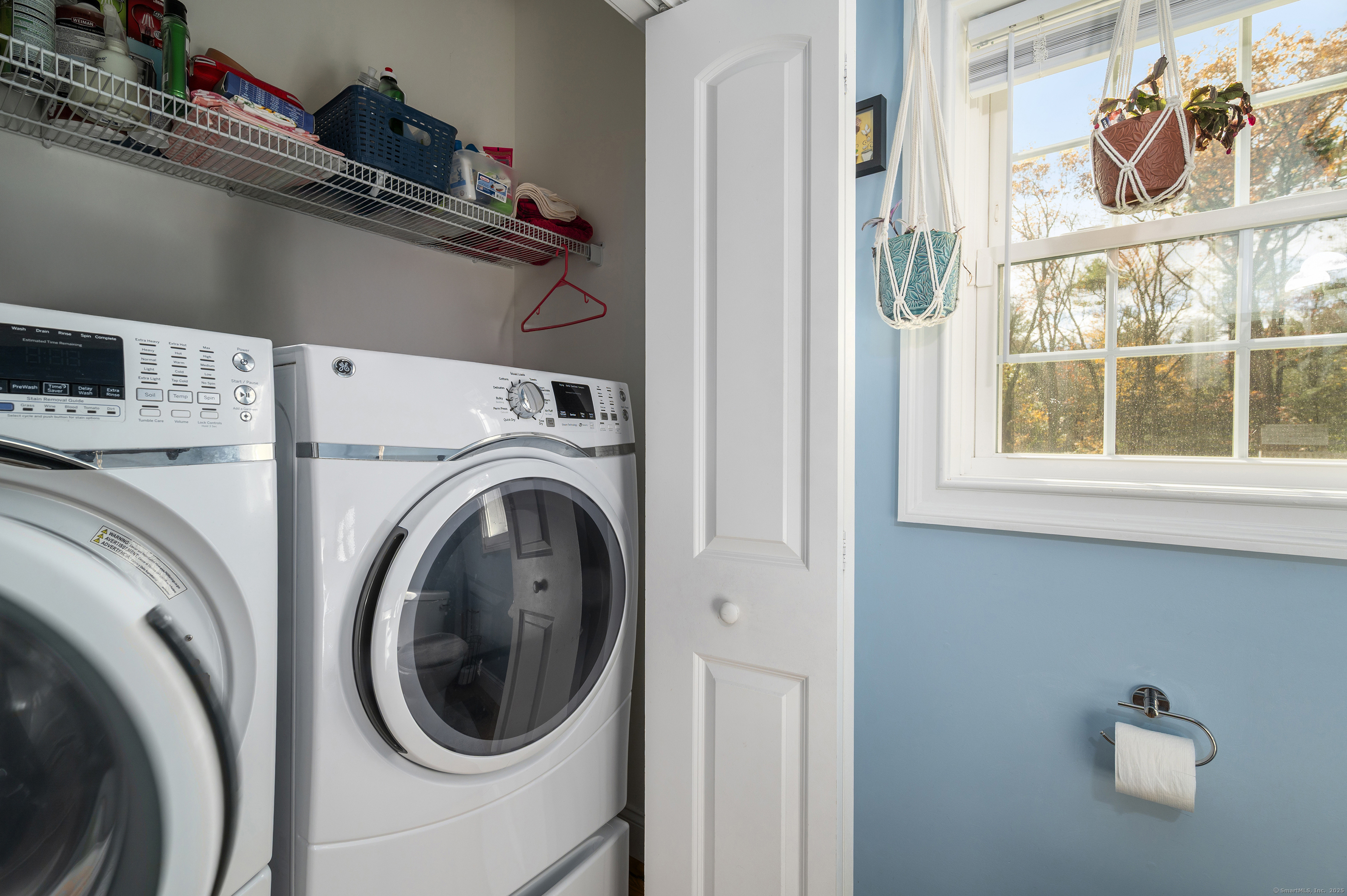 153 Wauregan Road Canterbury, CT 06331 - Photo 26 of 40 a utility room with dryer and washer