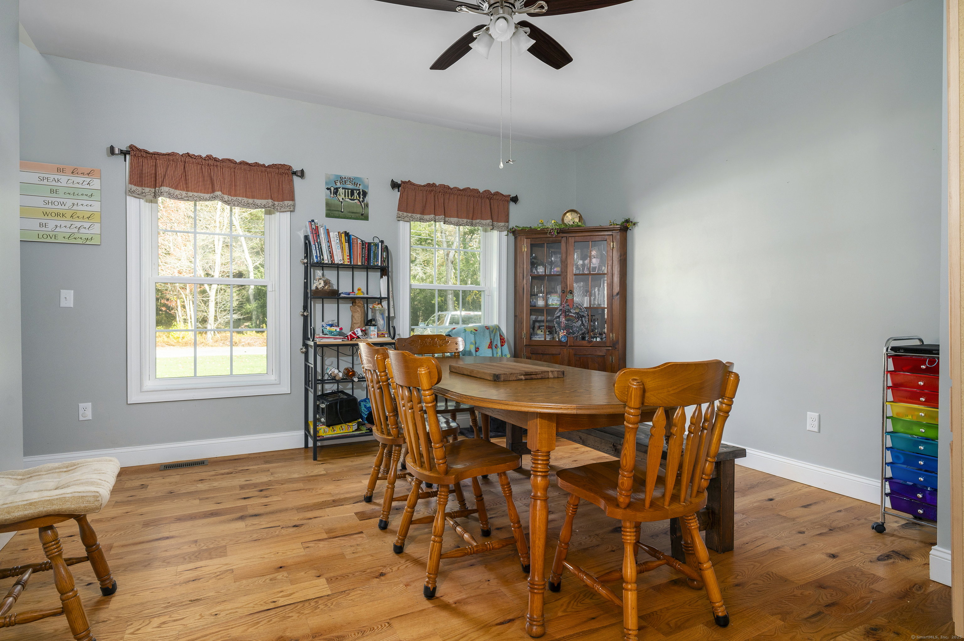 153 Wauregan Road Canterbury, CT 06331 - Photo 27 of 40 a view of a dining room with furniture and a window
