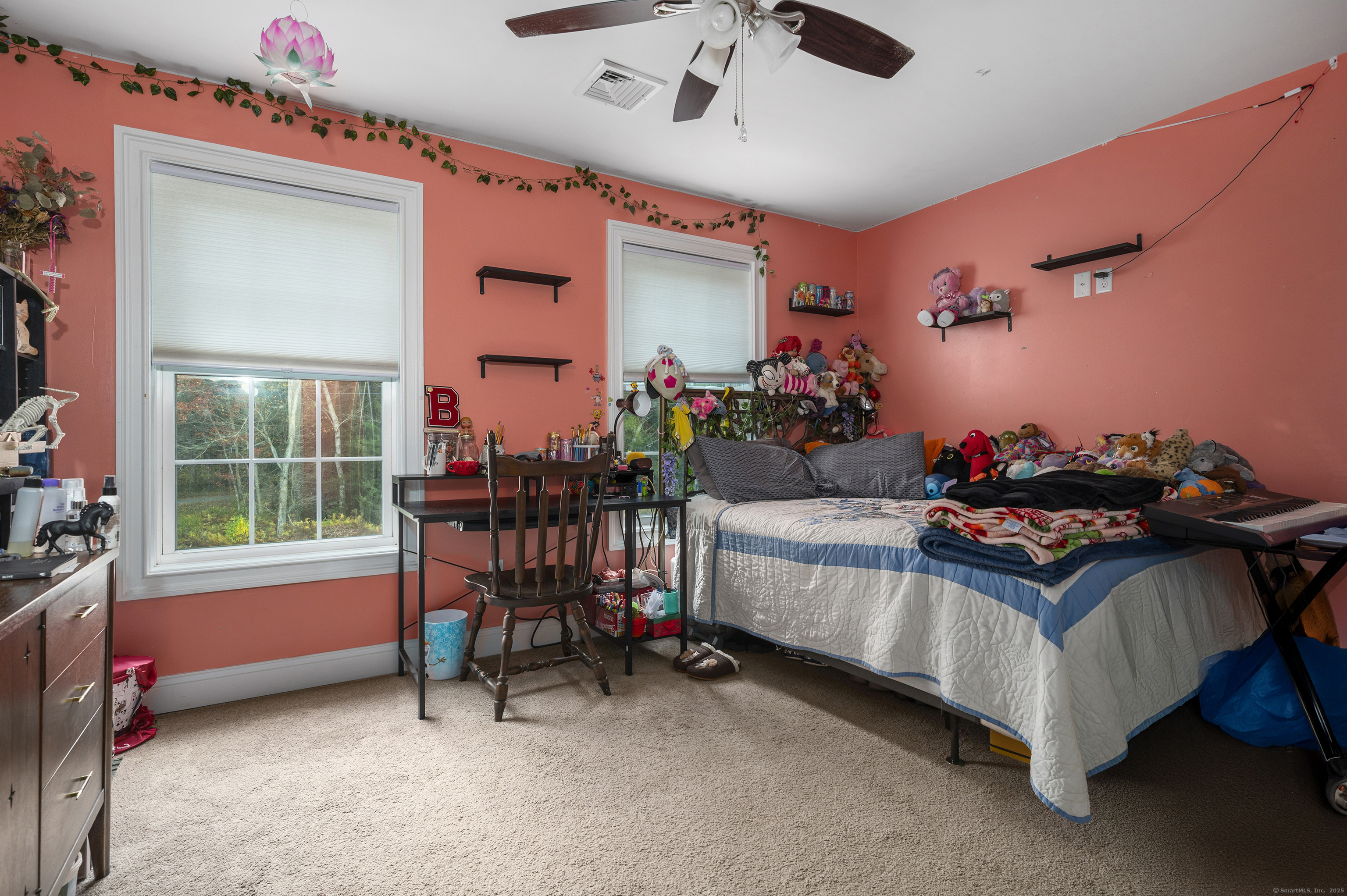 153 Wauregan Road Canterbury, CT 06331 - Photo 32 of 40 a bedroom with furniture and a window