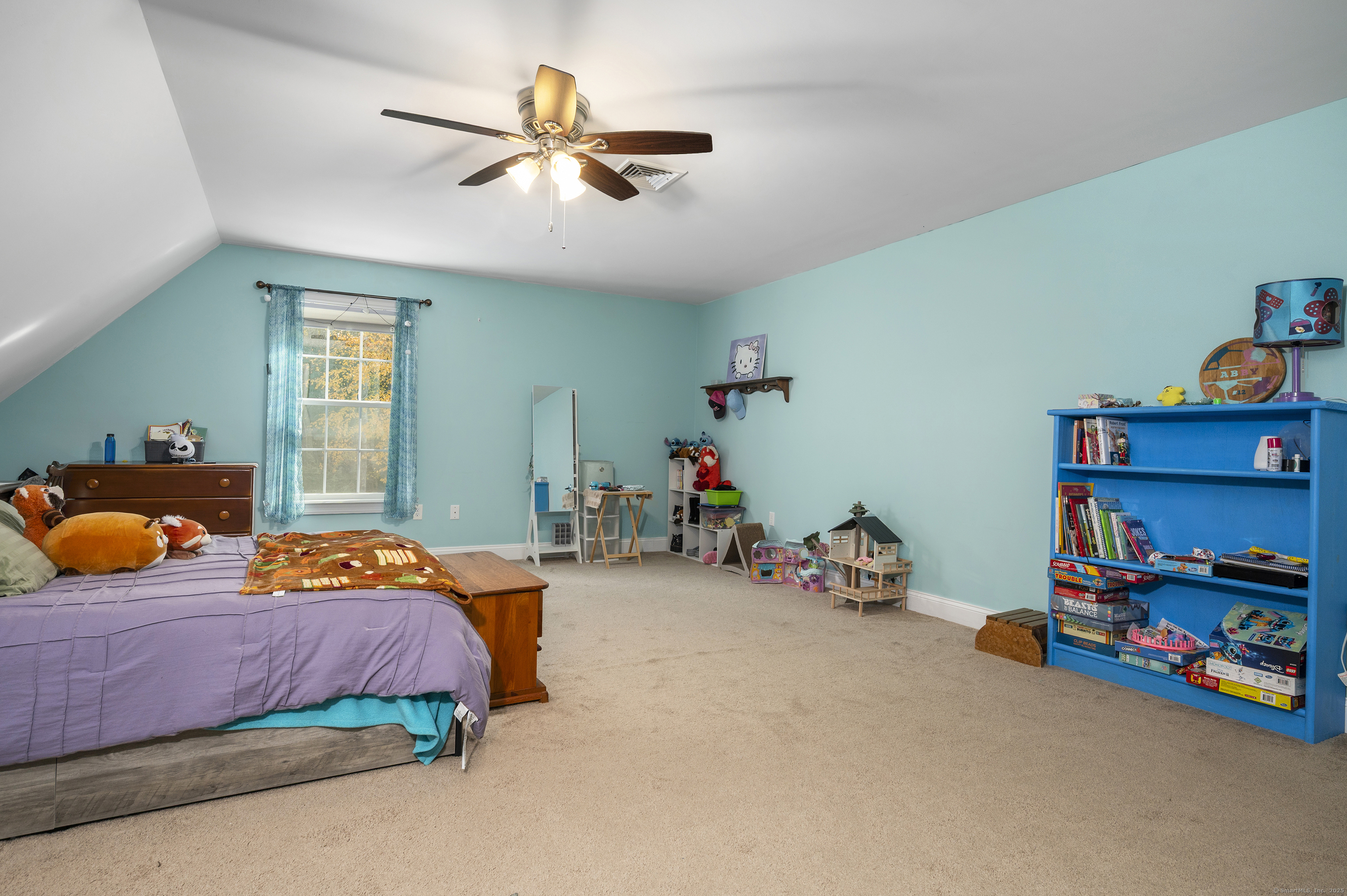 153 Wauregan Road Canterbury, CT 06331 - Photo 34 of 40 a bedroom with a bed and a wooden floor