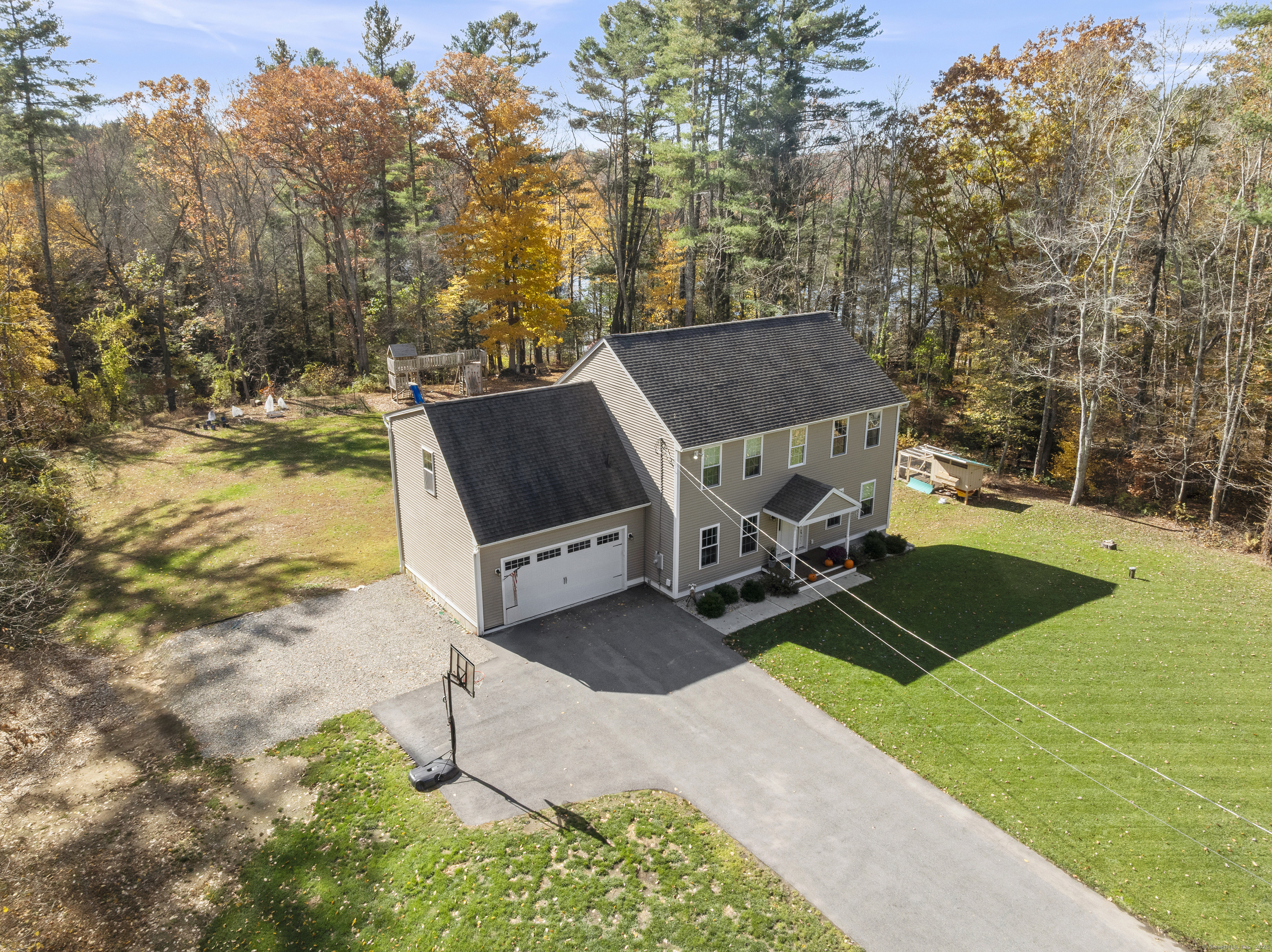 153 Wauregan Road Canterbury, CT 06331 - Photo 4 of 40 a view of a backyard with chairs