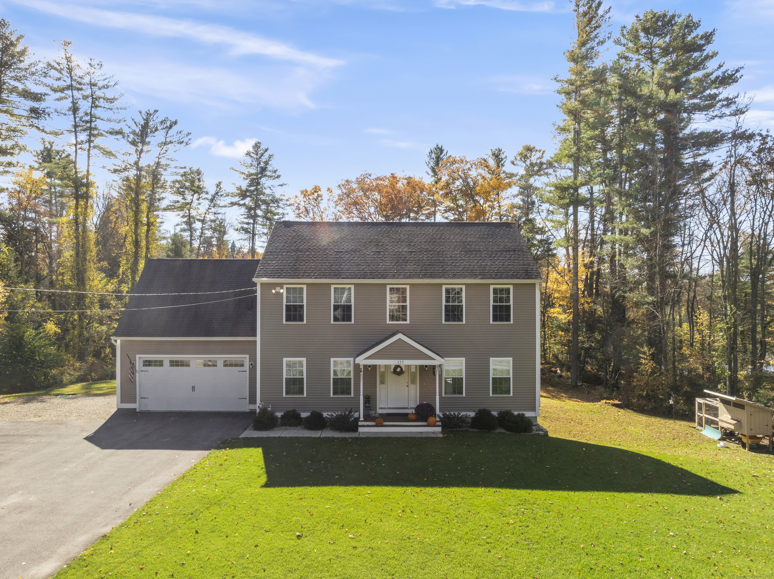 153 Wauregan Road Canterbury, CT 06331 - Photo 7 of 40 a view of a house with a big yard