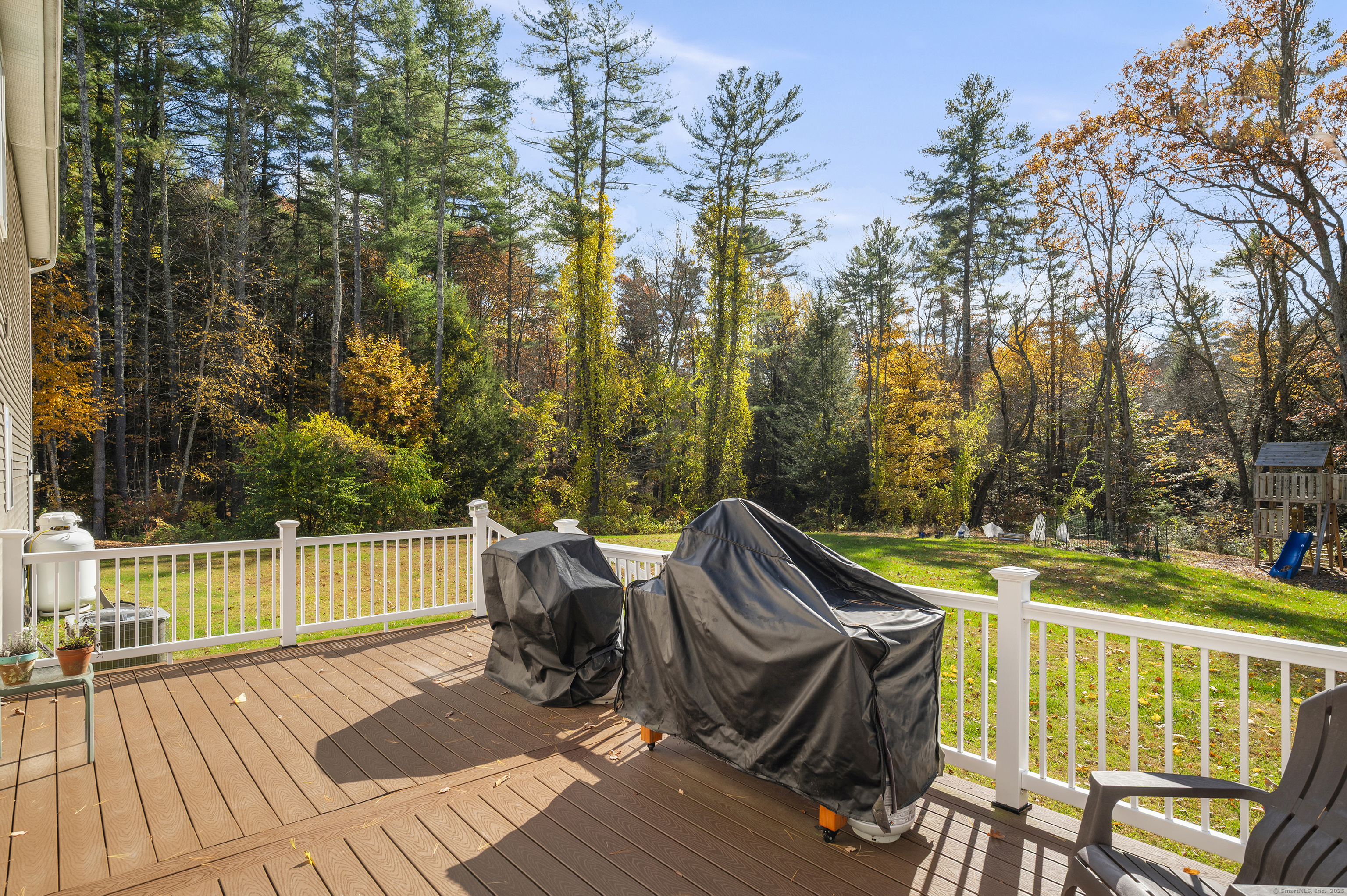 153 Wauregan Road Canterbury, CT 06331 - Photo 10 of 40 a view of a patio with iron fence