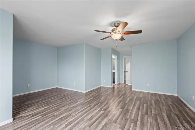 a bathroom with a sink double vanity granite tub and a mirror