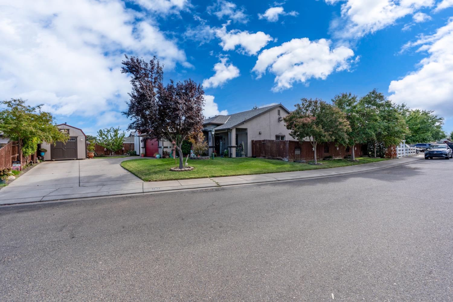 7353 Reece Wade Court Winton, CA 95388 - Photo 1 of 1 a view of road with houses